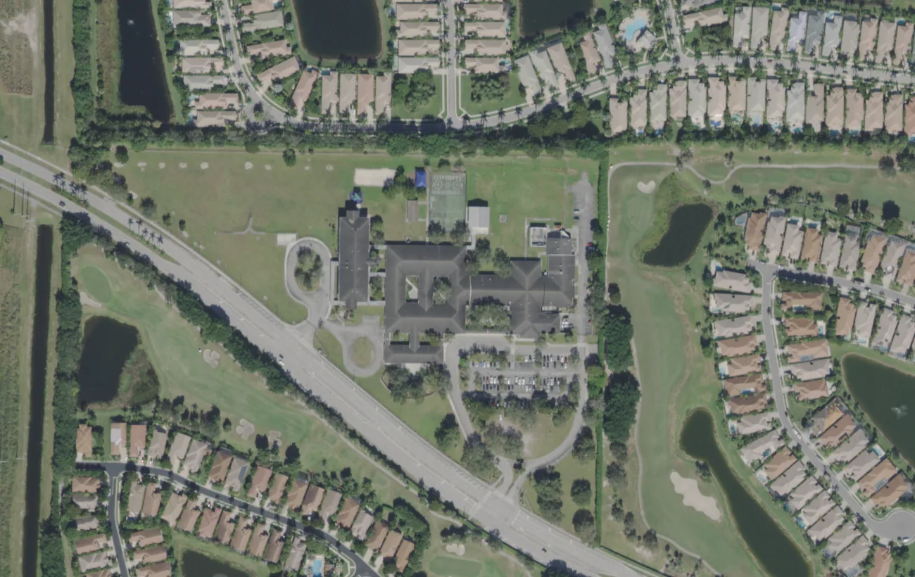 Panther Run Elementary on Lake Worth Road in Wellington from the air, with homes on both sides of the campus