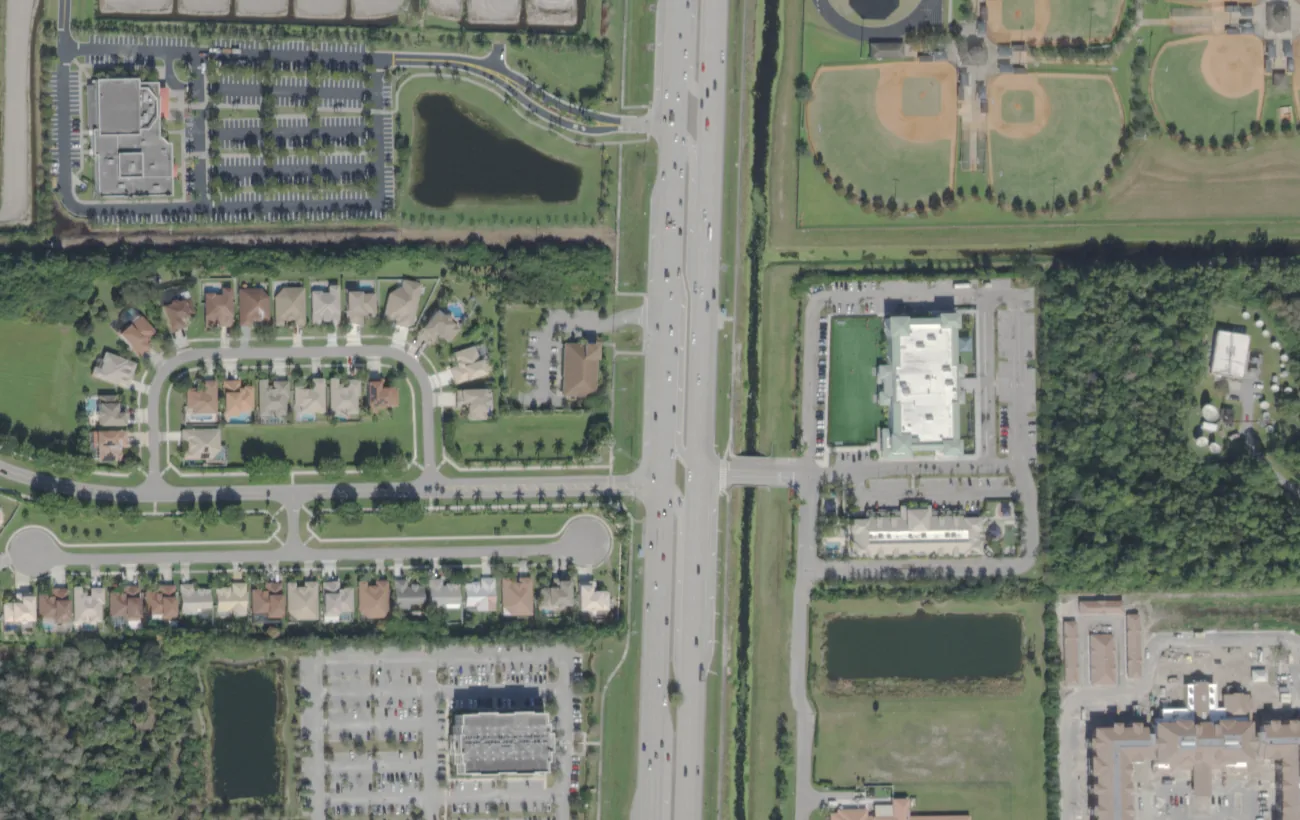 Renaissance Charter School at Wellington on State Road 7 from the air, with its sports field beside the building