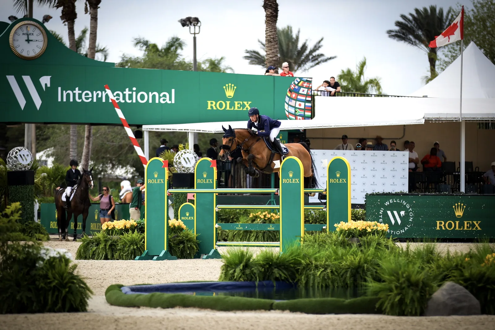 German rider Daniel Deusser clears a fence in the International Arena at Wellington International.